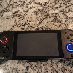 Portable Black Handheld Gaming Controller with Dual LED Joysticks